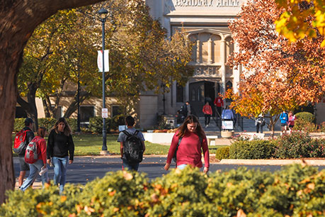 Students walking on campus. Links to Gifts of Real Estate