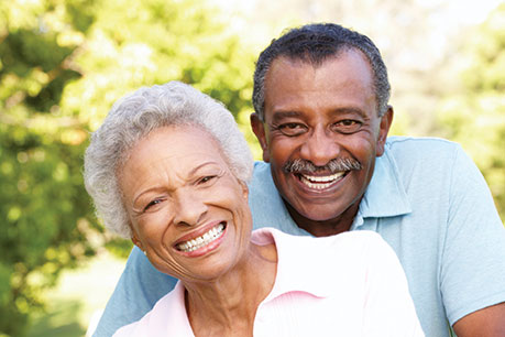 Photo of a man and woman smiling. Link to Life Stage Gift Planner Ages 60-70 Situations.