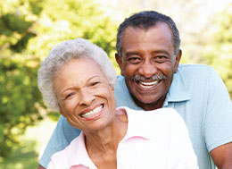 Photo of a man and woman smiling. Link to Life Stage Gift Planner Ages 60-70 Situations.