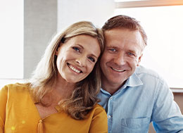 Photo of a couple smiling. Link to Life Stage Gift Planner Under Age 60 Situations.