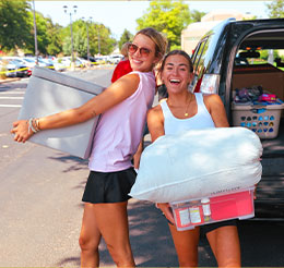 Photo of students moving in. Link to Gifts of Life Insurance.